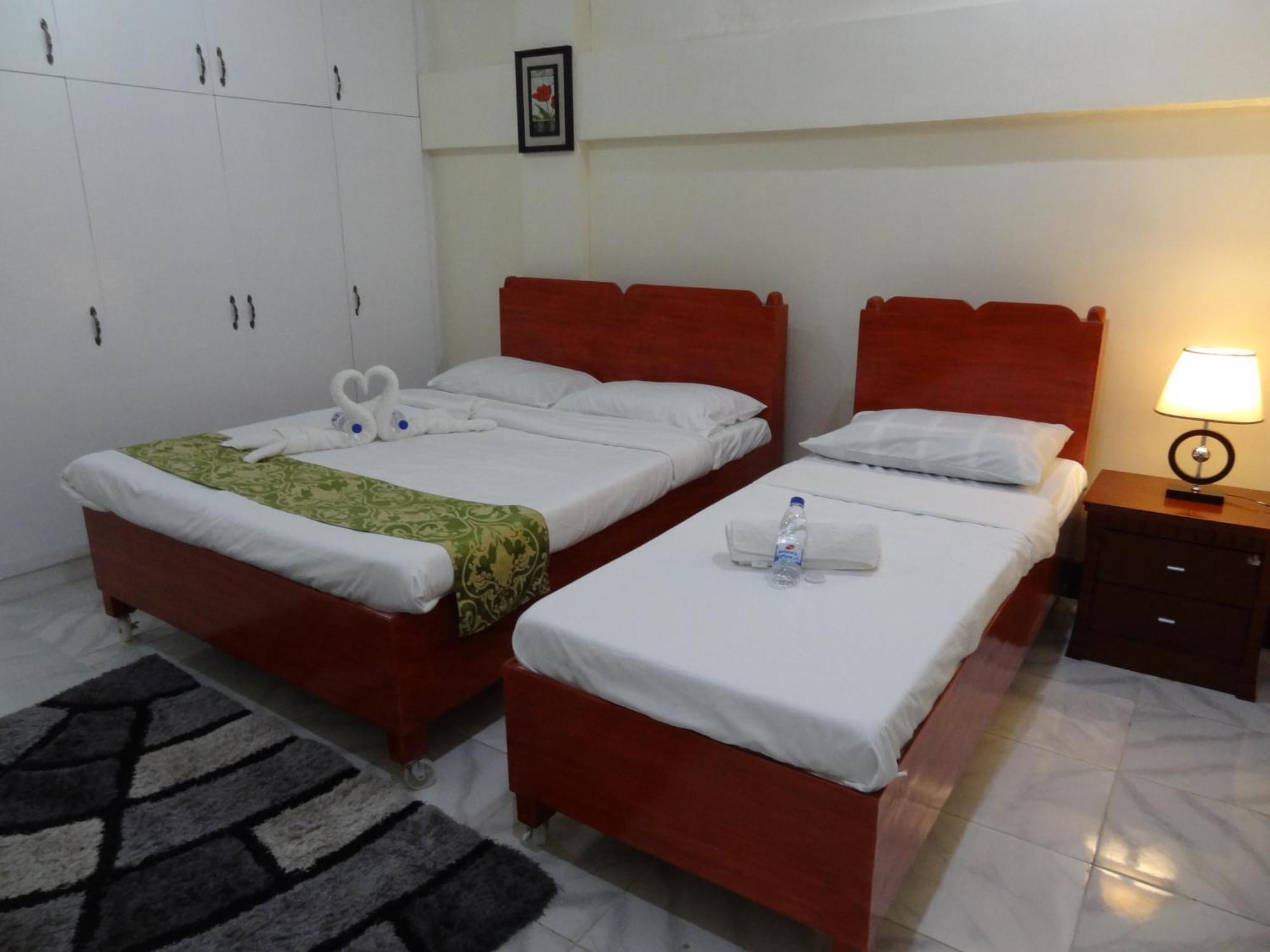 The Executive Villa Inn & Suites Davao Habitación foto